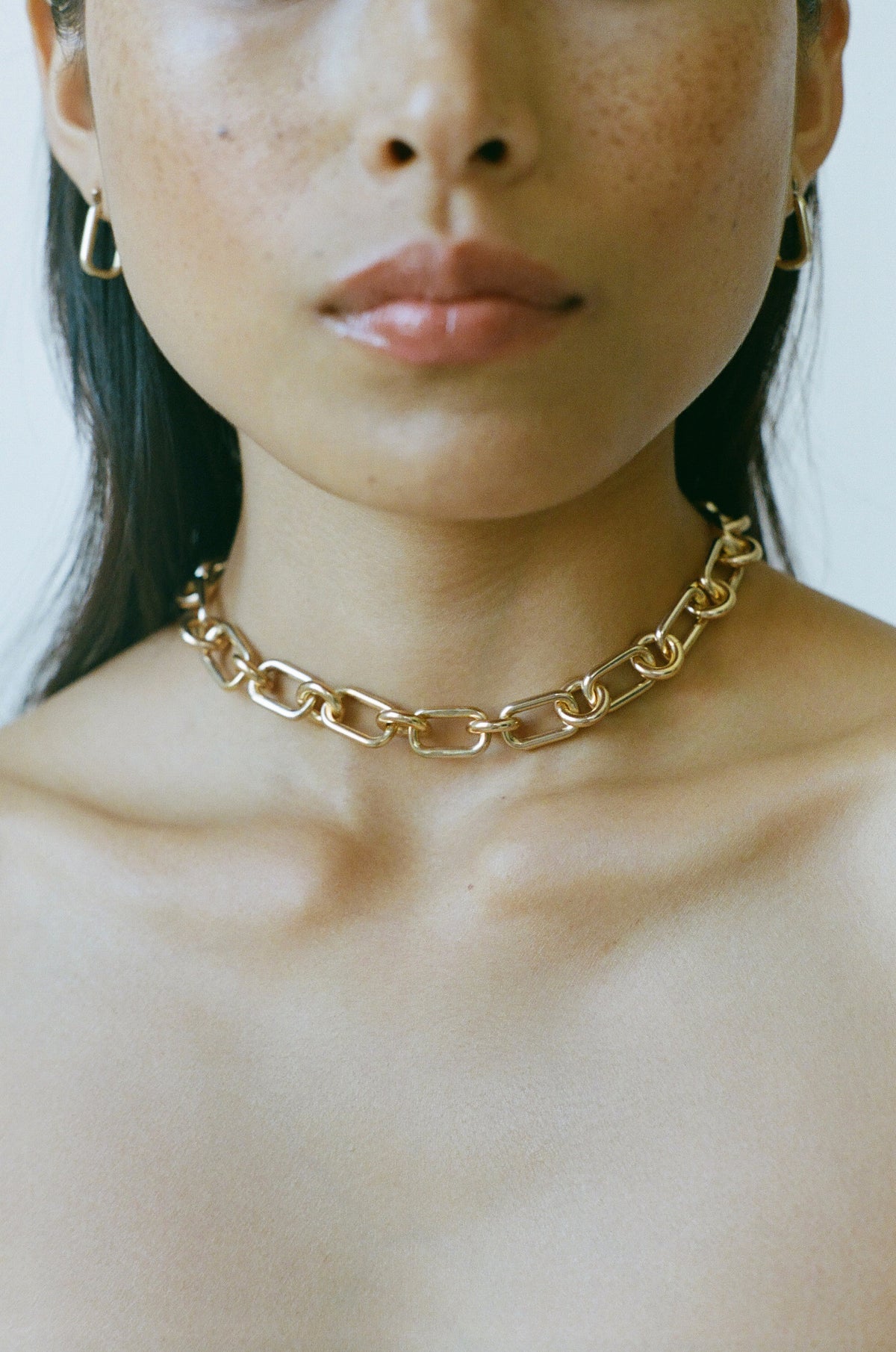 Model wearing Laura Lombardi gold Cresca Necklace
