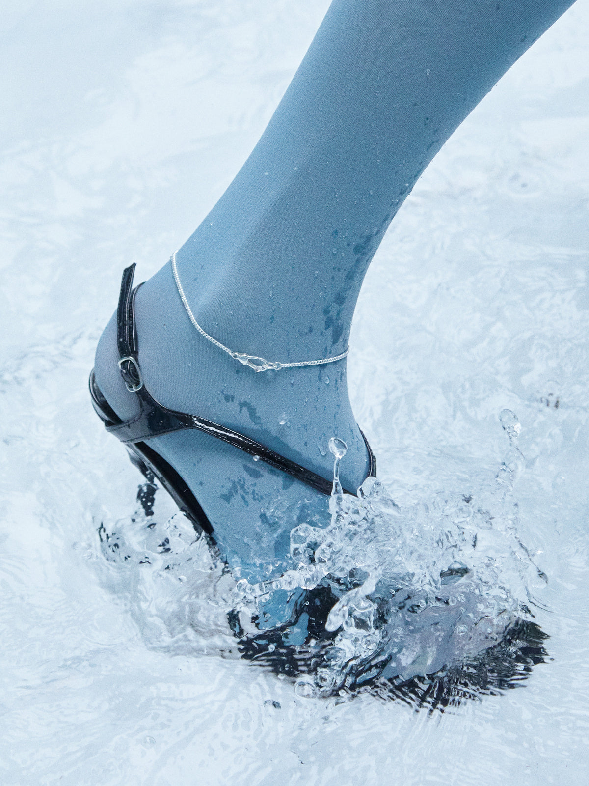 Model wearing Laura Lombardi Silver Via Anklet