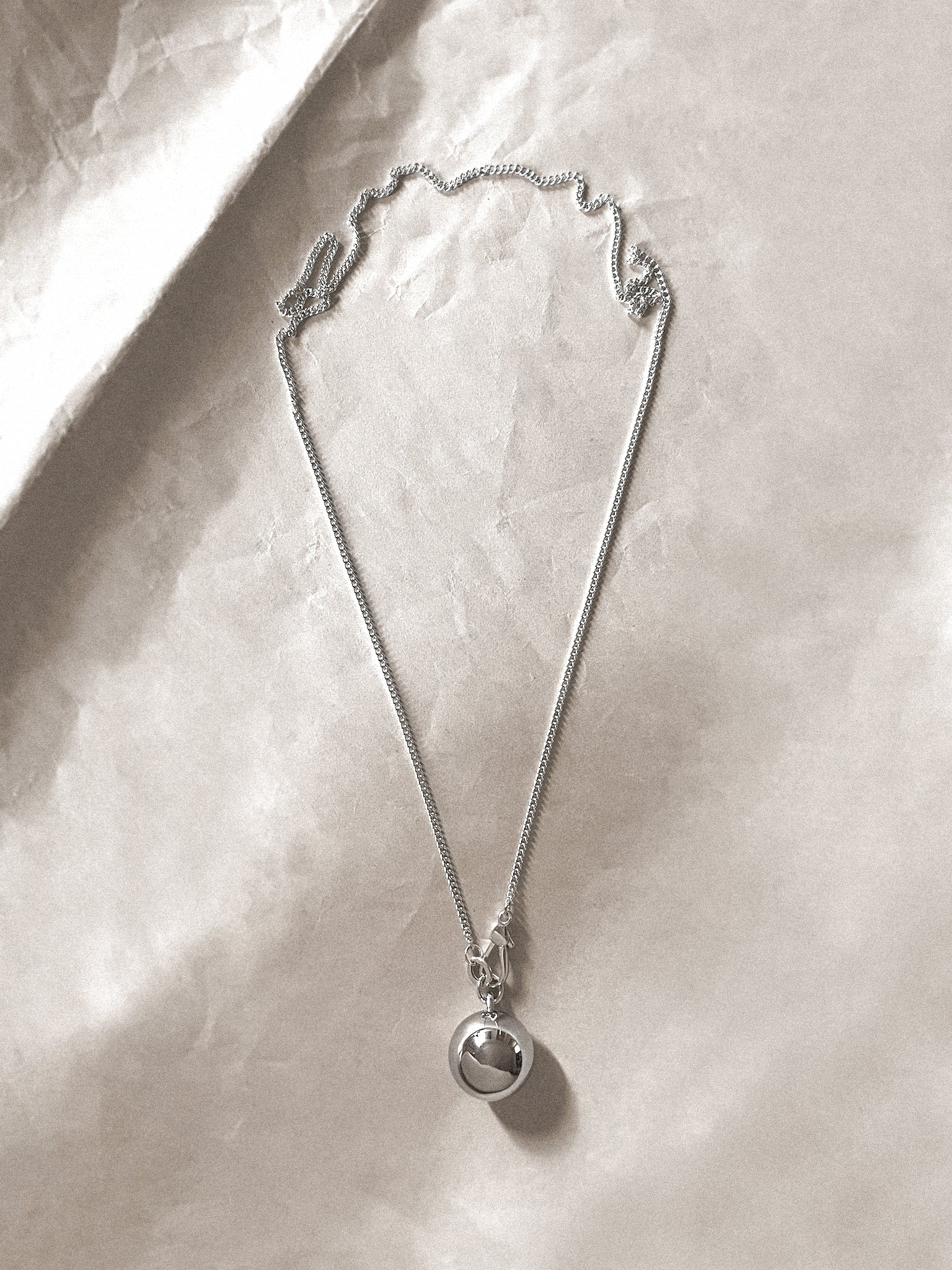 Laura Lombardi Silver Gioca Pendant on flat neutral background.