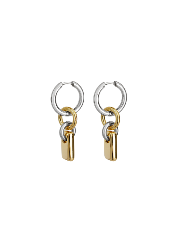 Pair of silver hoops with gold rectangular charms on a neutral background.