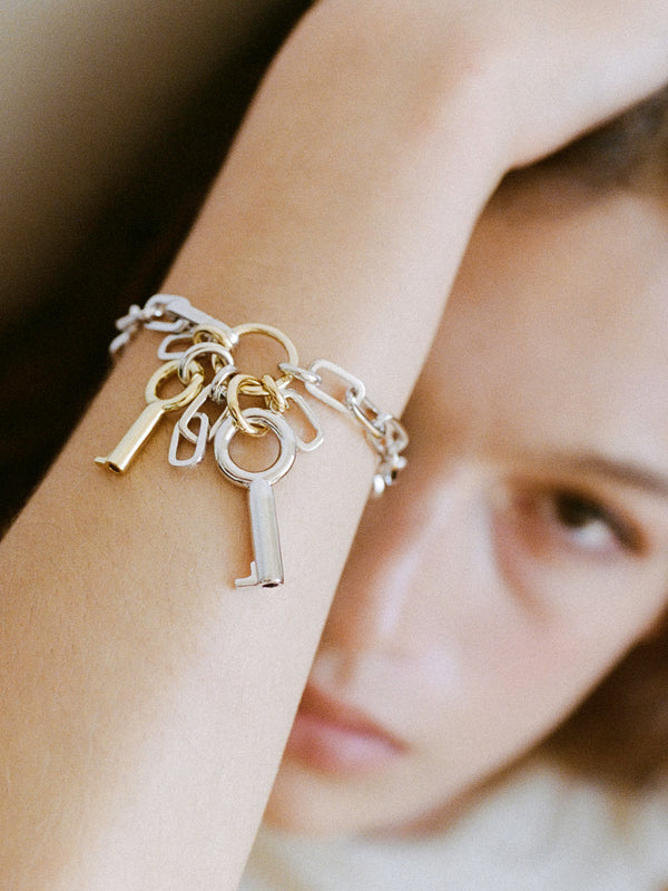 Closeup of model wearing the Two Tone Permesso Bracelet.
