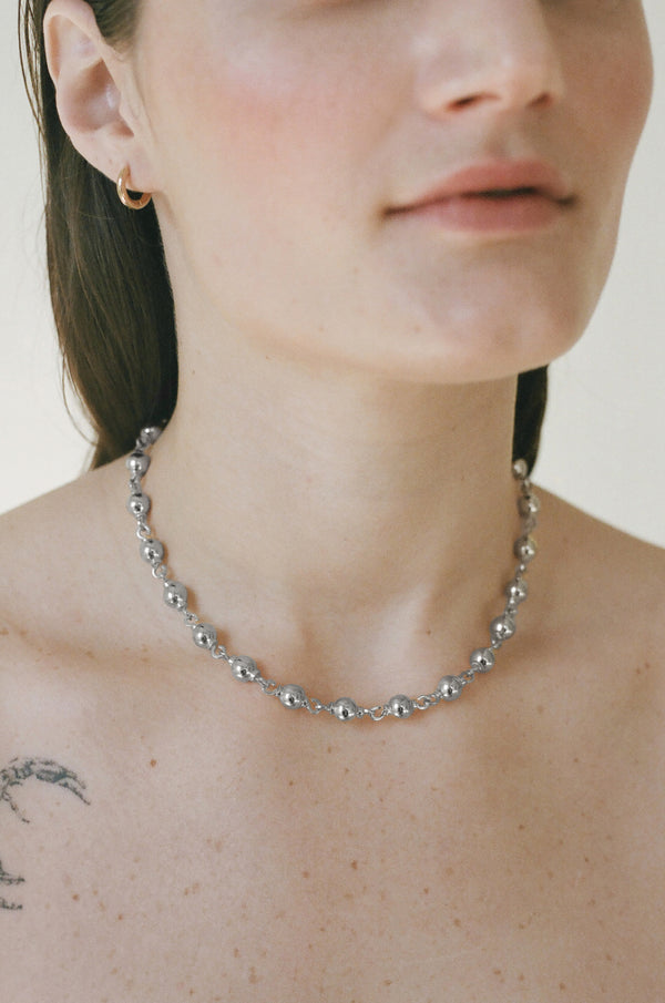 Model wearing Laura Lombardi Silver Suona Necklace