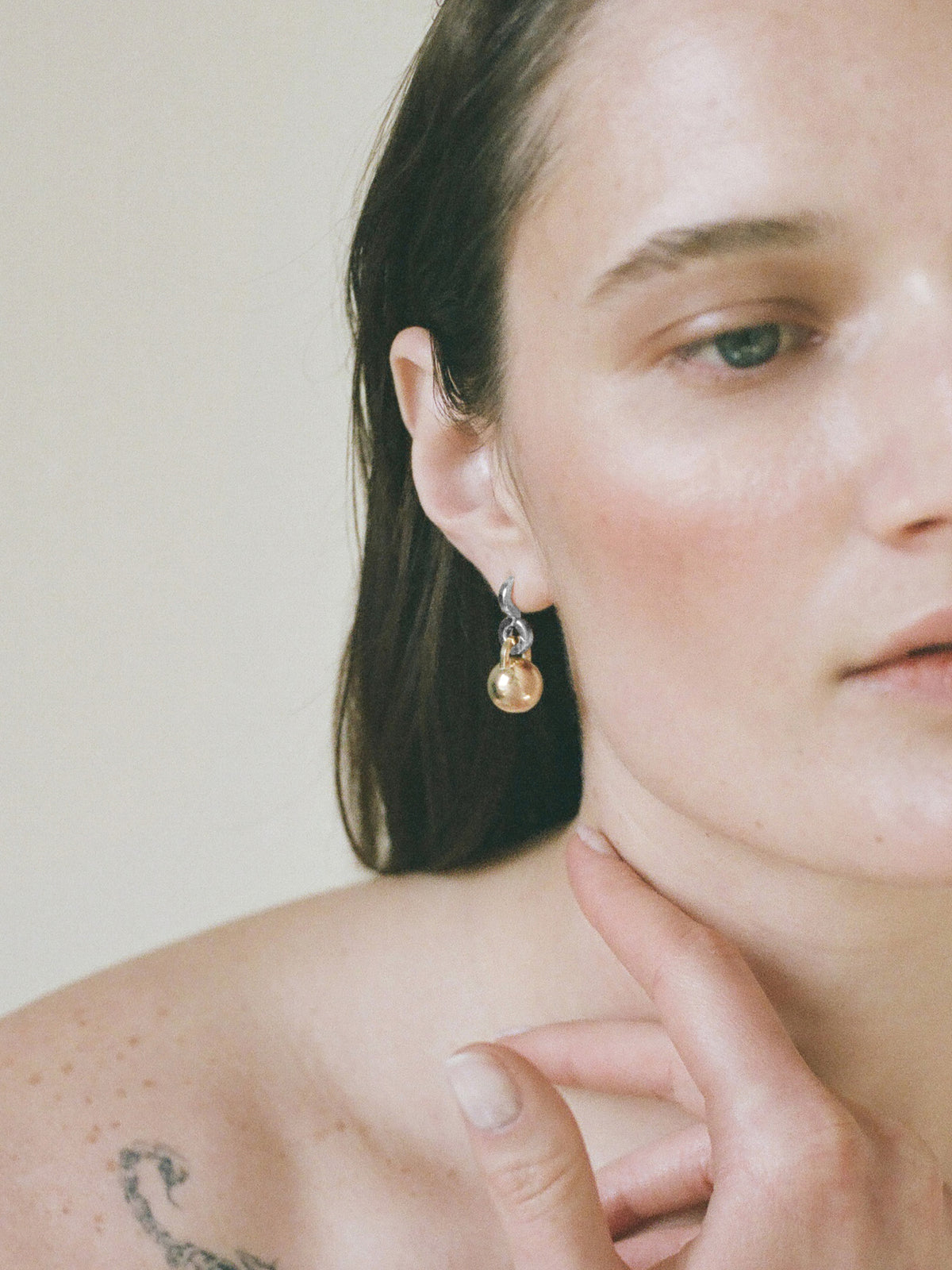 Model wearing Laura Lombardi Two Tone Gioca Earrings