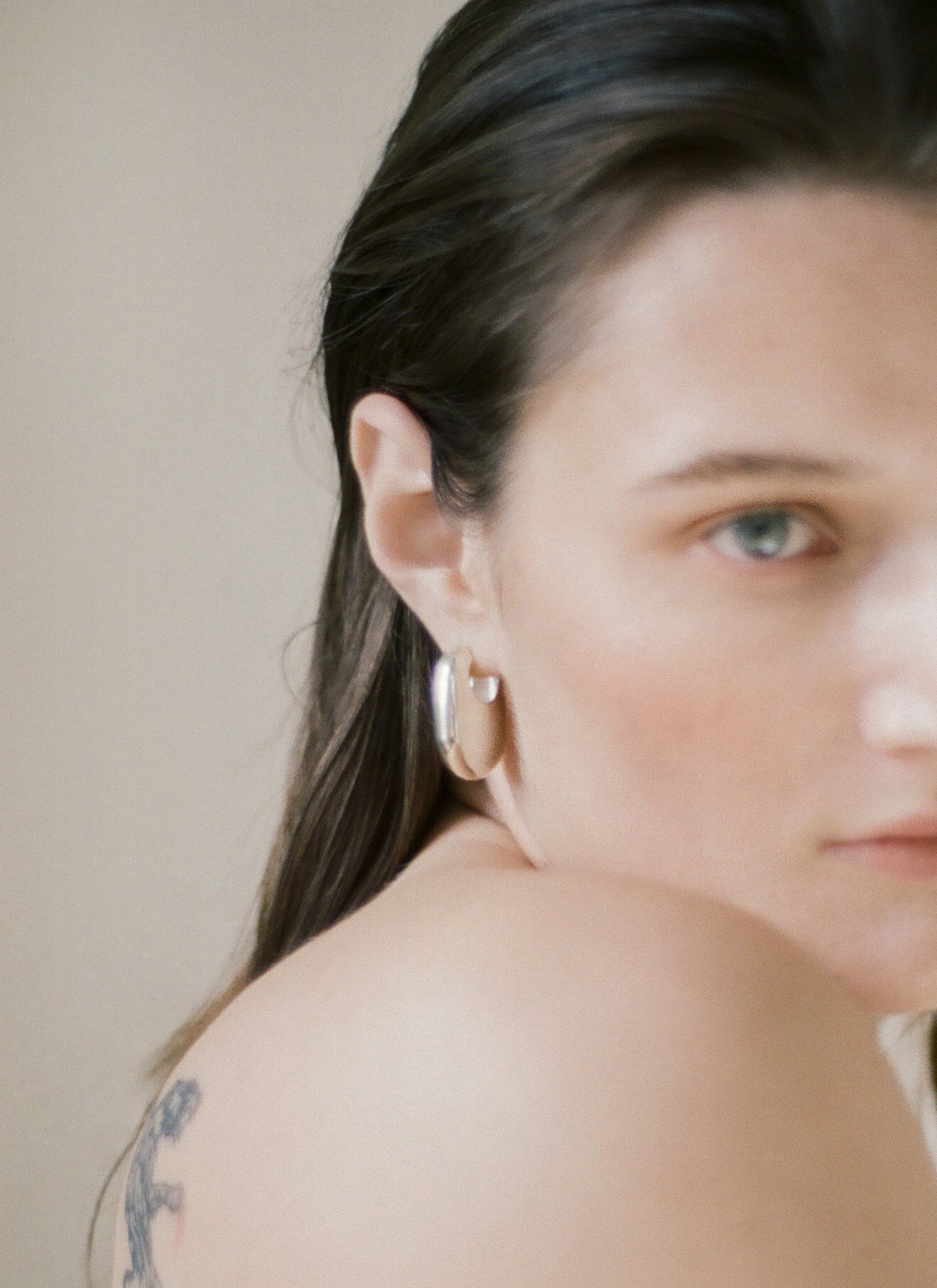 Model wearing Laura Lombardi Silver Vola Earrings
